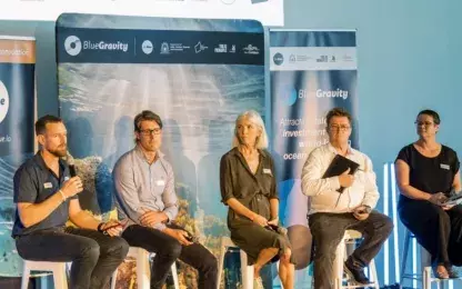 people sitting on a stage