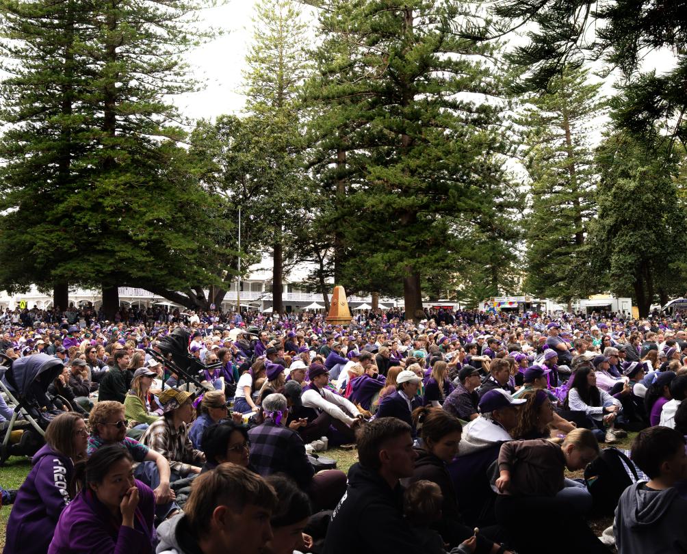 a crowd of families at the Esplanade Park in Fremantle on Grand Final day