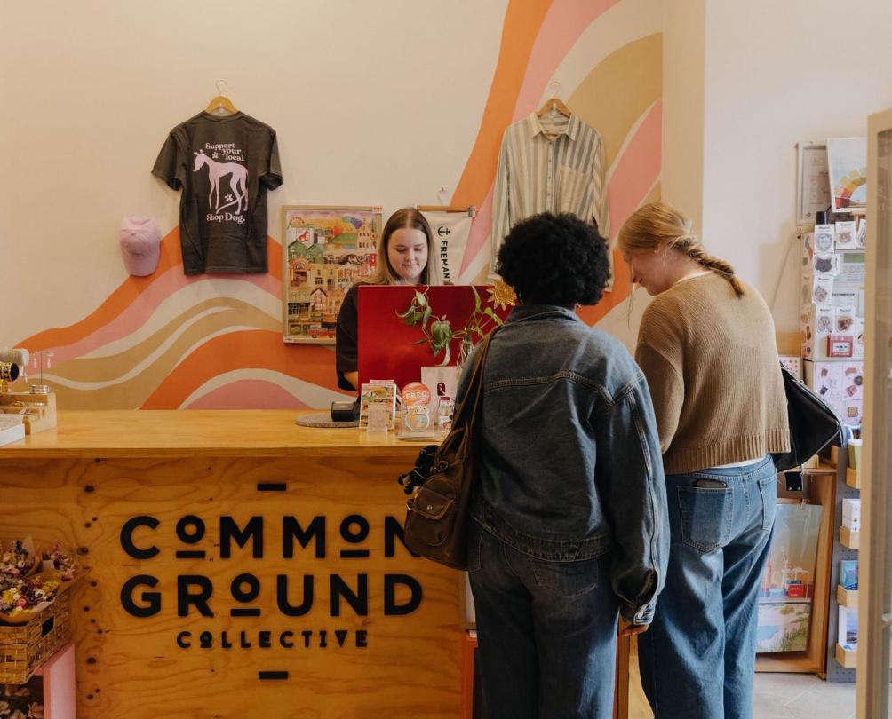 people making a purchase at common ground collective in Fremantle